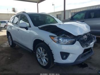  Salvage Mazda Cx